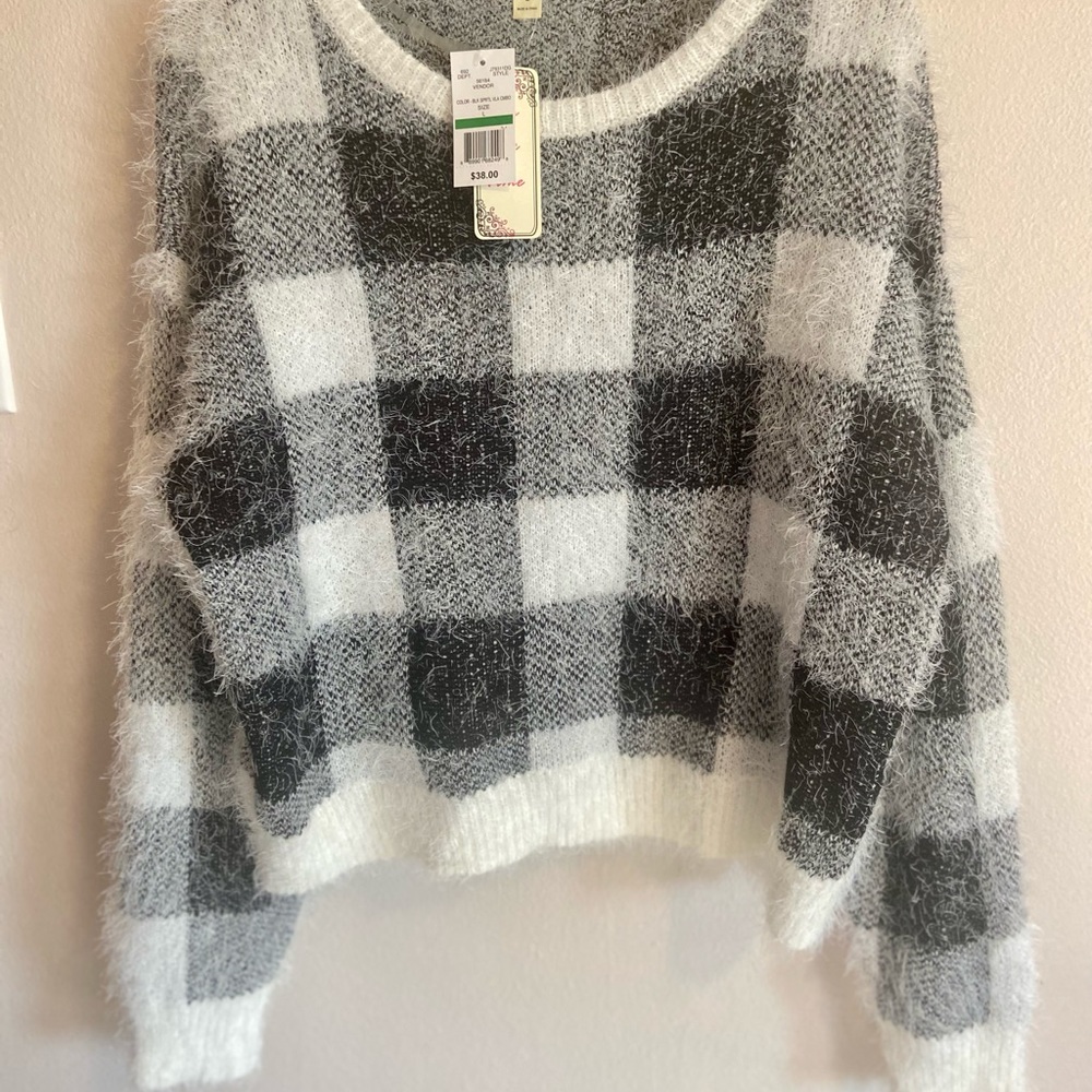 Brand new It’s Our Time Plaid Black and White Sweater from Dry Goods.